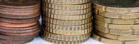Panorama of a lot of stacks of coins used in the European Union. euro cent coin background.の写真素材