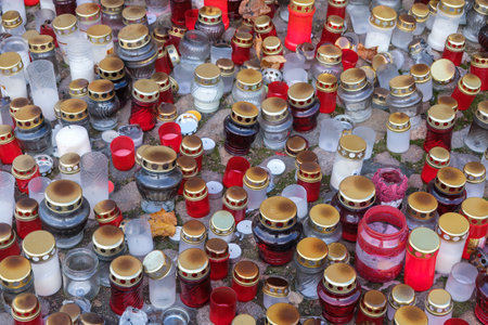 many candles on the sidewalk on the day of remembrance of the victims.の写真素材