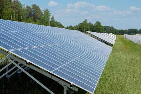 Rows of solar panels in a field. solar power plant. with solar panels. alternative energy sources. solar farm.の写真素材