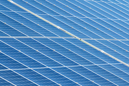 Close-up of the surface of solar cells. Landscape of solar panels at a photovoltaic power plant. concept of sustainable resources and renewable energy.の写真素材