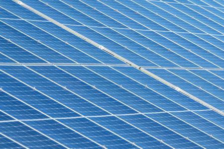 Close-up of the surface of solar cells. Landscape of solar panels at a photovoltaic power plant. concept of sustainable resources and renewable energy.の素材 [FY310207834507]