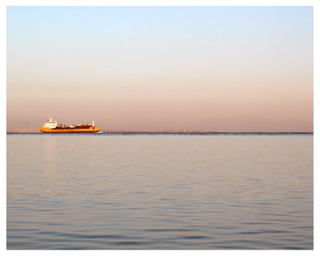 The ship swims along the sea along the pier. Egypt. Red Sea.の写真素材