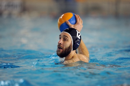 WARSAW, POLAND - DECEMBER 08, 2015: Polish Waterpolo Super League Legia Warsaw - DSW Waterpolo Poznanop: water polo playersのeditorial素材