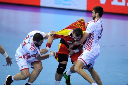 CRACOV, POLAND - JANUARY 21, 2016: Men's EHF European Handball Federation EURO 2016 Krakow Tauron Arena Macedonia - Croatiao/p: Ilija Brozovic Zharko Peshevski Luka Sebeticのeditorial素材