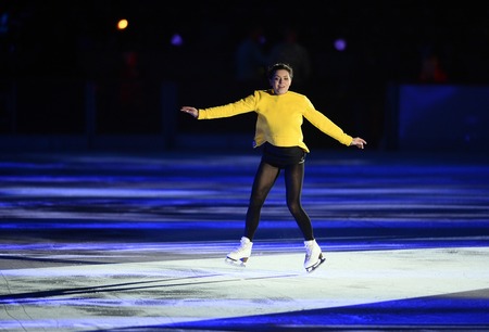 WARSAW, POLAND - FEBRUARY 27, 2016: Kings on Ice figure skating show jump made by Evgeni Plushenko and life music by Edvin Marton Emmy award winner world famous violinist playing with 300 year old Stradivariusnz Adelina Sotnikovaのeditorial素材