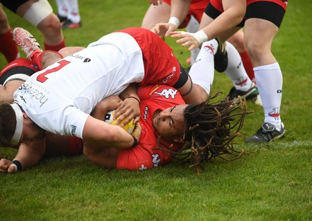 WARSAW, POLAND, APRIL 22, 2017: Inernational rugby game Poland - Switzerland Europe Rugby Cupo / p Poland and Switzerland rugby teams during the game in actionのeditorial素材