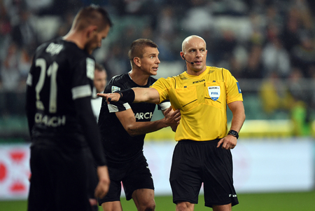 17 SEPTEMBER, 2017 - WARSAW, POLAND: Polish Extra League football match Legia Warszawa - Cracovia Krakow
o/p Oleksii Dytiatiev (Cracovia) Szymon Marciniak refreeのeditorial素材