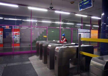 Warsaw, Poland, April 16, 2020: Warsaw during first day with hiding nose and mouth restriction during corona virus quarantine, people in public communicationのeditorial素材