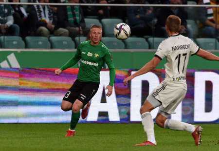 WARSAW, POLAND - SEPTEMBER 19, 2021: Polish Football League game Legia Warszawa - Gornik Leczna, Marcel Wedrychowski (Gornik Leczna)のeditorial素材