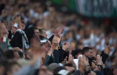 WARSAW, POLAND - OCTOBER 17, 2021: Polish Football League game Legia Warszawa - Lech Poznan, Legia supportersのeditorial素材