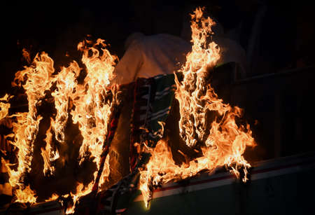 WARSAW, POLAND - NOVEMBER 28, 2021: Polish Football League game Legia Warszawa - Jagiellonia Bialystok, Legia fans set fire to scarves and flags of other clubsのeditorial素材