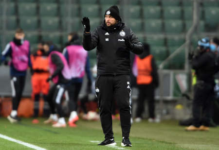WARSAW, POLAND - DECEMBER 09, 2021: UEFA Europa League group Stage game Legia Warszawa - FC Spartak Moscov, Marek Golebiewski coach (Legia Warsaw)のeditorial素材