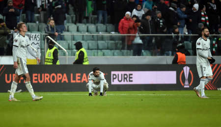 WARSAW, POLAND - DECEMBER 09, 2021: UEFA Europa League group Stage game Legia Warsaw - FC Spartak Moscov, Maik Nawrocki (Legia Warsaw) Luquinhas (Legia Warsaw)のeditorial素材