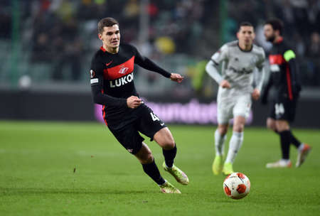 WARSAW, POLAND - DECEMBER 09, 2021: UEFA Europa League group Stage game Legia Warszawa - FC Spartak Moscov, Roman Zobnin (FC Spartak Moskva)のeditorial素材