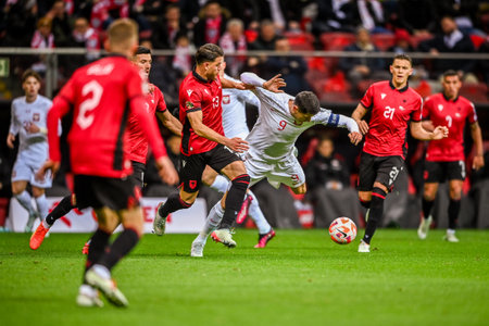 WARSAW, POLAND - MARCH 27, 2023: European qualifiers EURO 2024 group stage Poland - Albania o/p: Enea Mihaj (Albania) Robert Lewandowski (Poland)のeditorial素材