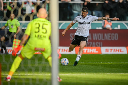 WARSAW, POLAND - APRIL 16, 2023: Polish Football League T-Mobile Ekstraklasa o/p: Pawel Wszolek (Legia)のeditorial素材
