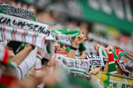 WARSAW, POLAND - APRIL 16, 2023: Polish Football League T-Mobile Ekstraklasa o/p: Legia fans supportersのeditorial素材