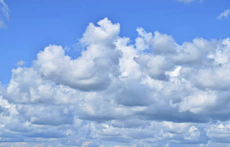 blue sky background with tiny clouds