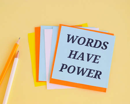 Words have power word on colorful notes.