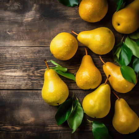 Fresh ripe organic pears on rustic wooden table. Vegetarian, vegan, healthy diet food. Selective focus. Top view, flat lay.の素材