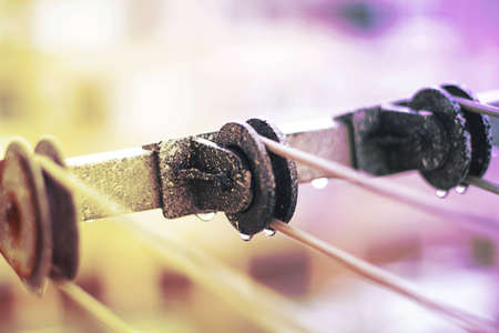 clothesline wet with raindropsの写真素材