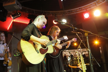 MOSCOW, RUSSIA - NOVEMBER 17: Miriam Kjolend and Oda Dahl play concert in "Gorbushkin Dvor" hall on November 17, 2012 in Moscow. Miriam and Oda are members of "Mhoo" Norvegian music band.のeditorial素材