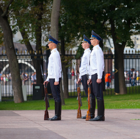 MOSCOW - JULY 29: Soldiers taking part in Changing of Honor Guard Ceremony near Tomb of Unknown Soldier in Alexander Garden on July 29, 2014 in Moscow. This Tomb is war memorial, dedicated to Soviet soldiers killed during World War II.のeditorial素材