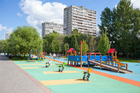 MOSCOW - AUGUST 2: Playground and residential buildings in Heritage Village Park in Bibirevo district on August 2, 2014 in Moscow. Bibirevo is administrative district of North-Eastern part of Moscow, Russia.のeditorial素材