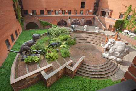 MOSCOW, RUSSIA - AUGUST 20, 2017: Statues of dinosaurs and a statue of mammoth at Paleontological Museum. The museum is named after Yuri Orlov (1893-1966).のeditorial素材