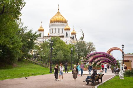 MOSCOW, RUSSIA - JULY 23, 2018: People walking along Gogolevsky Boulevard against Christ Savior Cathedral.This boulevard is located in center of Moscow.のeditorial素材
