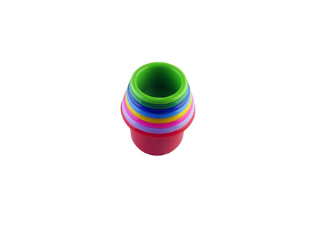 multicolor children's pyramid a toy on a white backgroundの写真素材