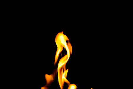 Fire and Flames against black backgroundの写真素材