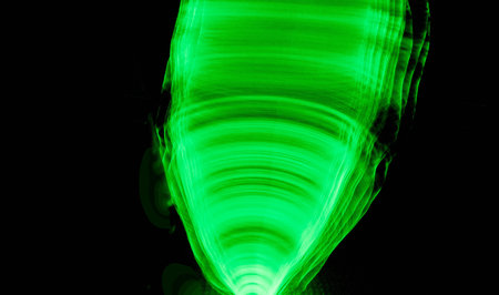 EL Wire Green Light Painting using a long shutter speedの写真素材