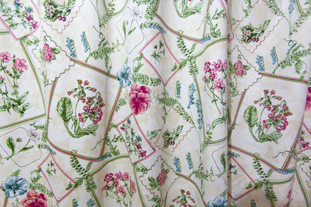 Artistic fabric texture background, cloth with pink flowers and leaves on white background