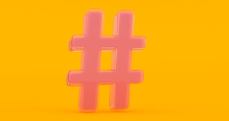 Volumetric glossy glass Hashtag icon isolated on orange background.の写真素材