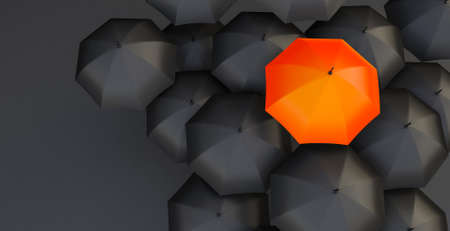 3d render of Unique red umbrella among many dark ones.の写真素材