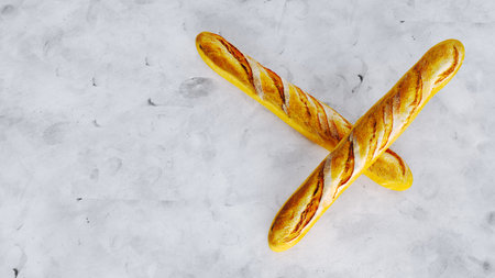 french baguette isolated on white background, freshly baked baguetteの写真素材