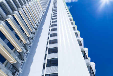 Bottom view of modern skyscrapers in business district, Business vision concept. 3D renderの写真素材
