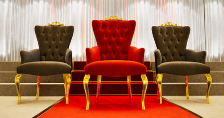 red carpet with golden barrieres leading to a red armchair, vip and success conceptの写真素材