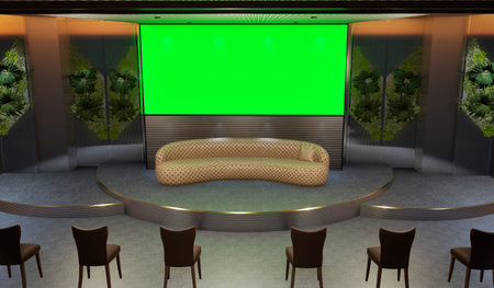 event stage featuring a large green screen at the back, a curved tan leather couch as the...