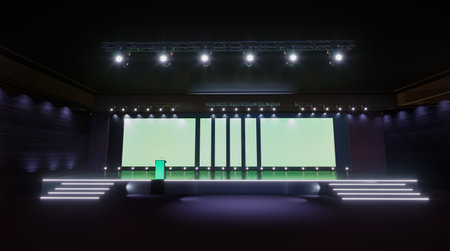 A modern stage setup with bright overhead lights and green screens, ready for a presentation or event.の写真素材