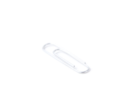 As single paperclip isolated on a white backgroundの写真素材