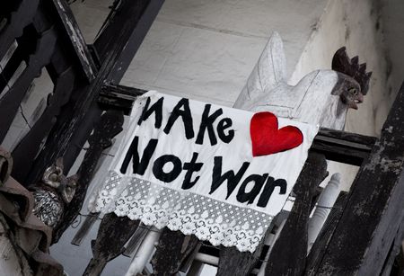Protest Sign Proclaiming Make Love Not Warの写真素材