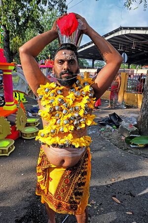 Penang, Malaysia - February 9th, 2017: A devotee is ready with his pierce kavadi on Thaipusam day.This sacrifice performed by devotees to worship Lord Muruganのeditorial素材