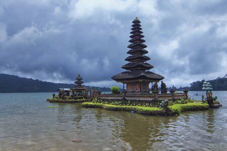 Unique architectural design of a floating tample at Bratan Lake inspired by Balinese Hinduismの写真素材