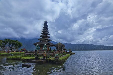 Landscape view of Bratan lake with a unique architectural design tample floating on the lakeの写真素材