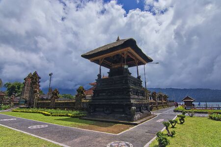 Beautiful architectural design of the wall of the Bratan Lake tample. Soft focus effect due to large aperture techniqueの写真素材