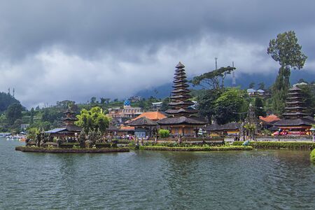 Beautiful heritage building of Pura Alun Danu Bratan here in Bratan lake. Soft focus effect due to large aperture techniqueの写真素材