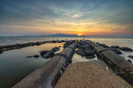 Great sunset view from the Robina beach in Penang, Malaysia.の写真素材