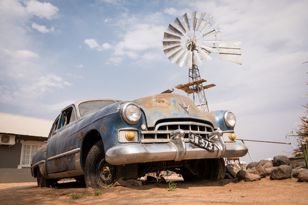 Classic car decaying in the desertのeditorial素材